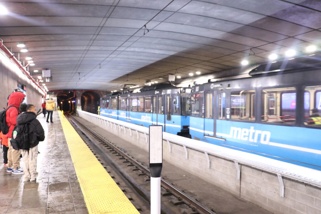 MetroLink train in tunnel at 8th & Pine Station platform.